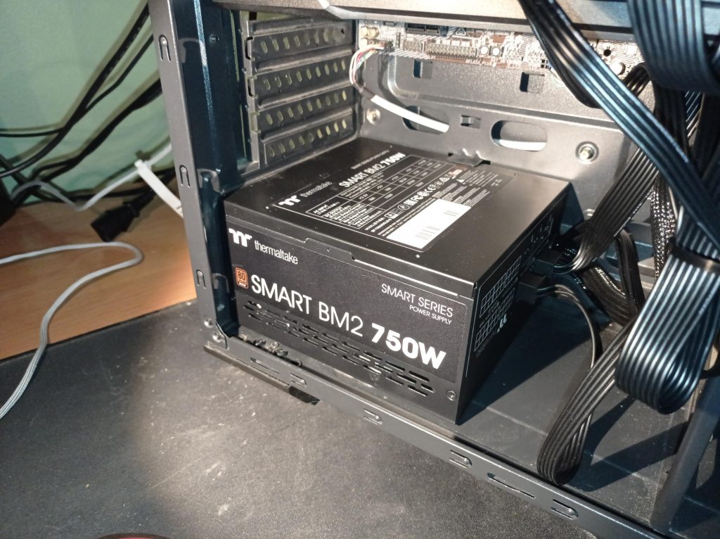 Place the PSU onto the mounting area